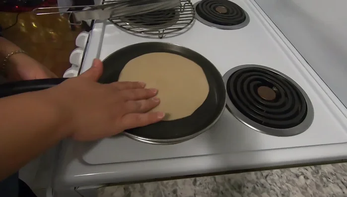 Cook each roti on a hot griddle or pan for 10-20 seconds per side, or until bubbles appear and the roti is cooked through.