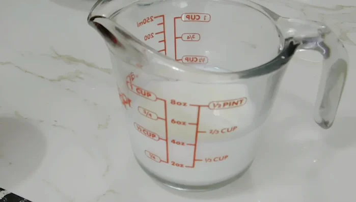 Prepare the yeast: Mix room temperature milk, warm water, sugar, and yeast. Let it sit for 5-10 minutes (22.74)