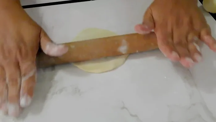 Assemble the pastries: Add filling to the dough, then shape it into your desired form (e.g., half-moon, square, boat). Use water as a binder (336.169)
