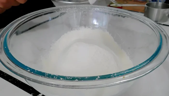 Prepare the flour mixture: Sift flour and salt, then mix well (39.89)
