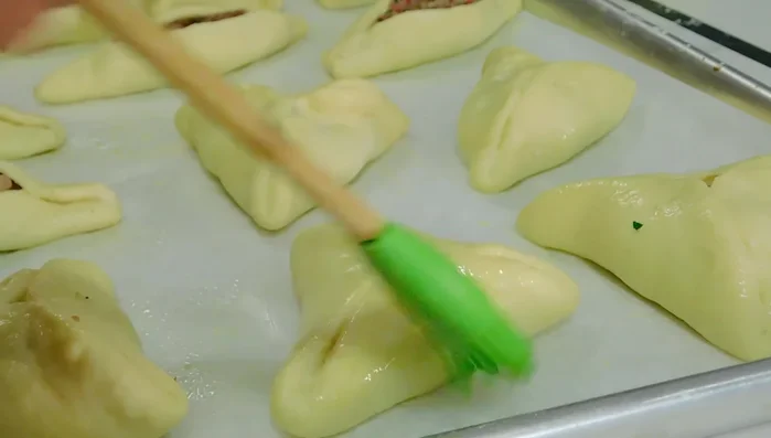 Egg wash: Brush the pastries with an egg wash (milk or olive oil can be substituted) (483)