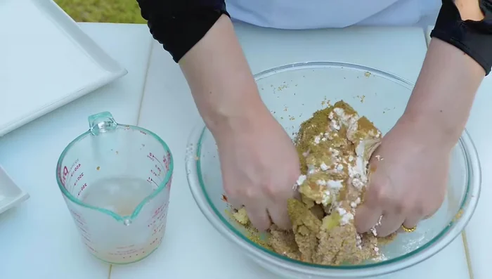 Combine mashed potatoes with bulgur dough, corn starch, seven spice, cinnamon, cumin, white pepper, basil, paprika, marjoram, and salt. Knead until well combined.