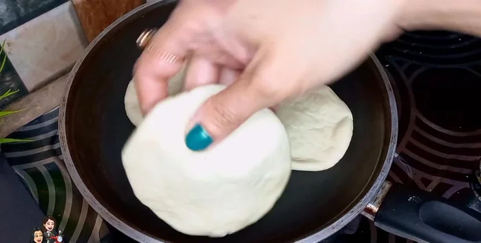 Bake the rotis on a heated pan over low flame without oil, until both sides are cooked and puffed. (175.879)
