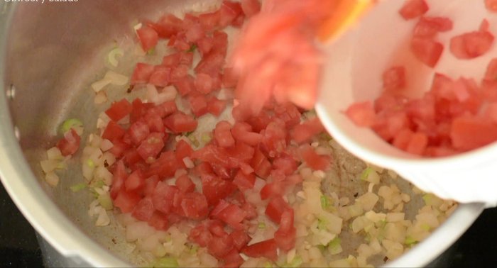 Add chopped tomatoes and cook for 3-5 minutes until soft.