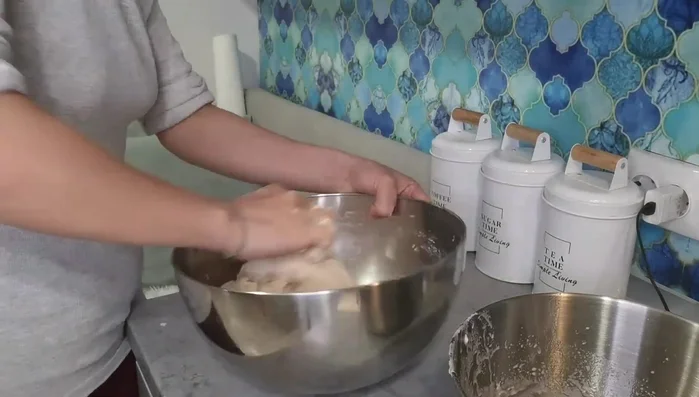 After resting, knead the dough for 10-15 minutes.