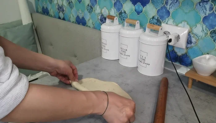 Fill each dough ball with date filling.