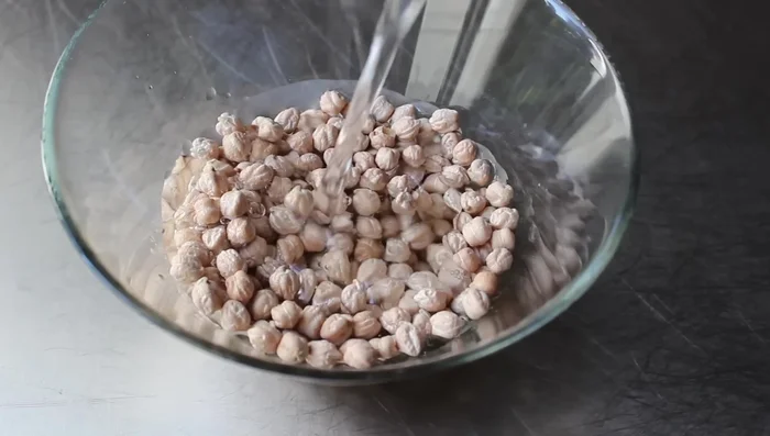 Soak the dried garbanzo beans in cold water overnight (at least 24 hours is recommended).