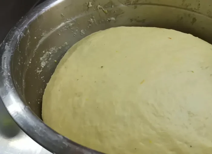 After an hour, roll the dough into small puri-sized circles.