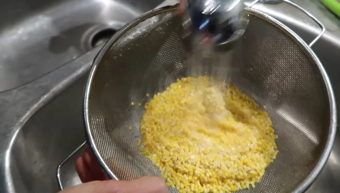 Rinse the split mung beans thoroughly and inspect for any pebbles or stones.