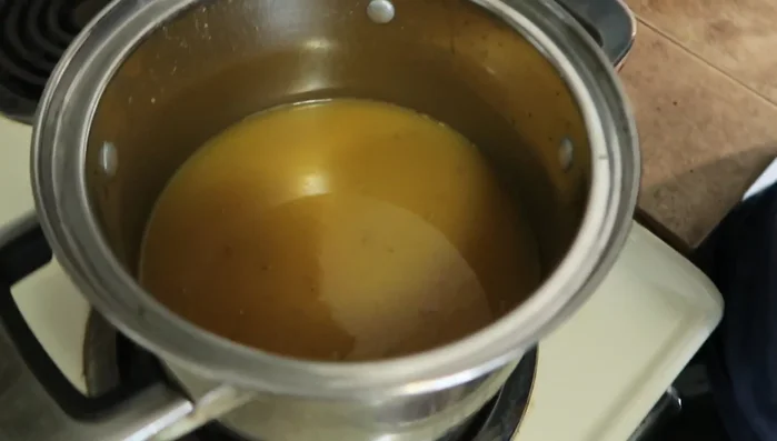 Bring the mixture to a boil, then reduce heat to a simmer for 25-30 minutes, or until all the liquid is absorbed. Stir occasionally to prevent burning.