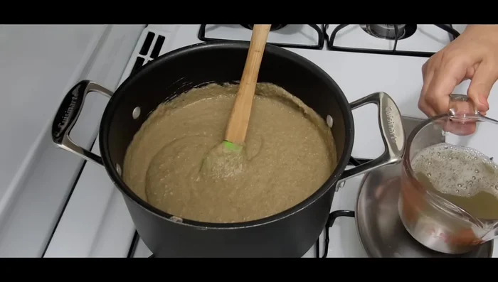 Boil 1/2 cup of Egyptian rice in 1 1/2 cups of reserved lentil cooking liquid. (101.22)