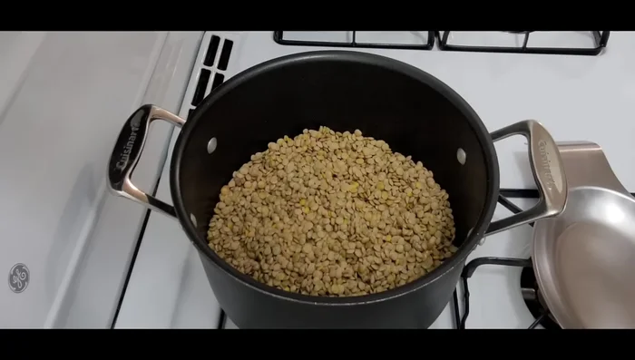 Wash 2 cups of lentils and add 8 cups of water to a medium-sized pot. Cover and bring to a boil over high heat. (20.84)