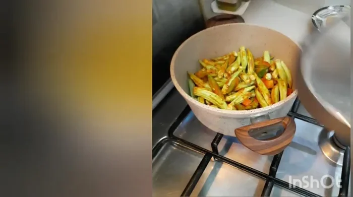 Add some water to the pot. Cover and let it simmer until the okra is cooked through.