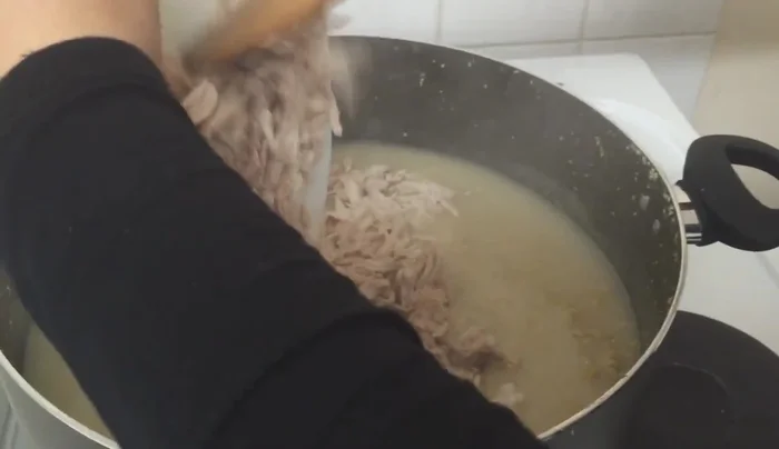 Add the cooked chicken to the wheat.