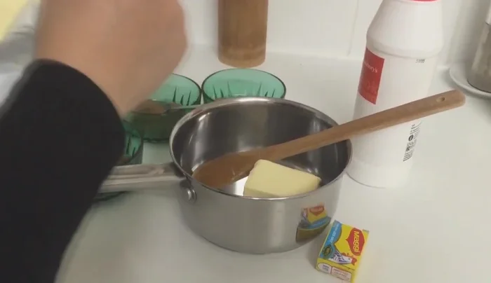 Prepare the spice mixture: Melt butter with Maggi cubes, seven spices, black pepper, cinnamon, and salt.