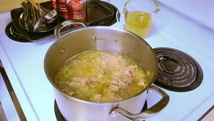 Return the meat to the pot.
