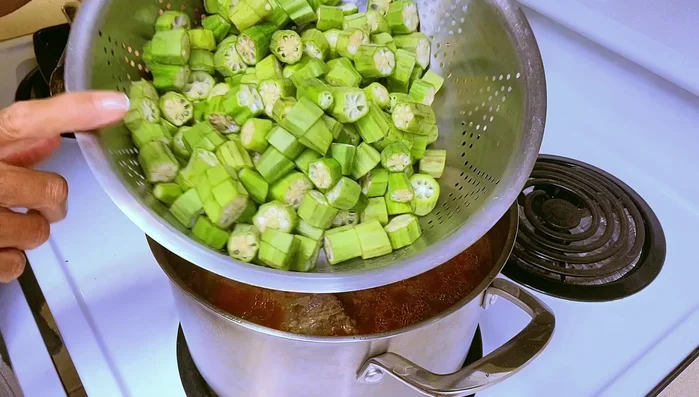Add fresh or thawed frozen okra.