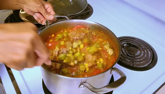 Reduce heat to simmer. Add more salt, pepper, and sugar to taste.