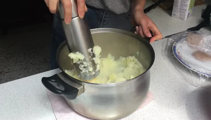 Optional: Add mashed potato and other desired ingredients to the dough before cooking.