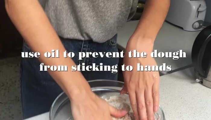 Add oil to the dough (helps with rolling).
