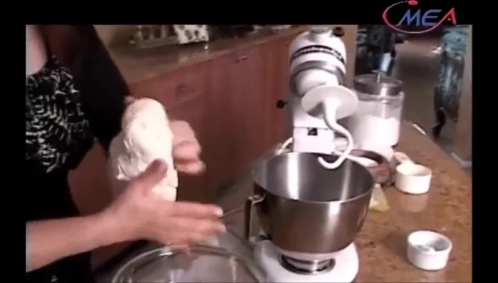 First rise: Form the dough into a ball, brush with olive oil, cover with plastic wrap and a kitchen towel, and let it rest for about an hour until doubled in size. (Start: 203.28)