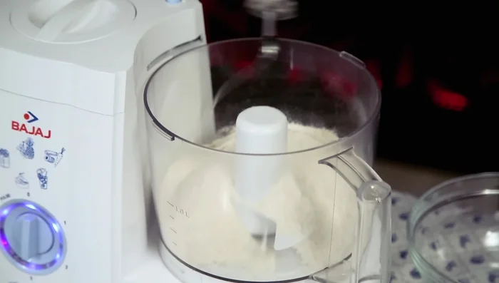 Make the dough: Combine wheat flour, oil, salt, and gradually add water using the food processor until a dough forms. Knead for 1 minute and let rest for 15 minutes.