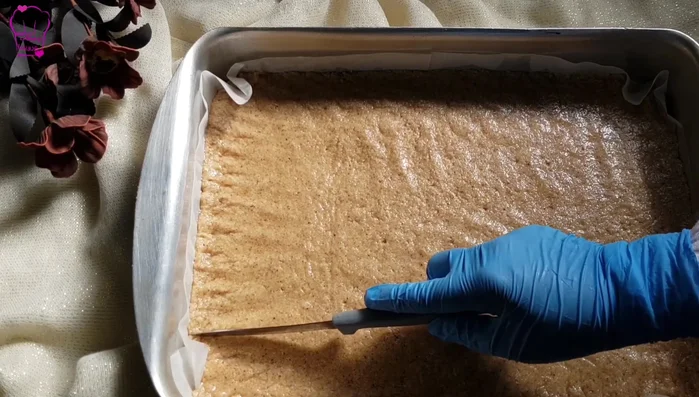Cut the dough into your desired size and shape. Decorate with almonds.