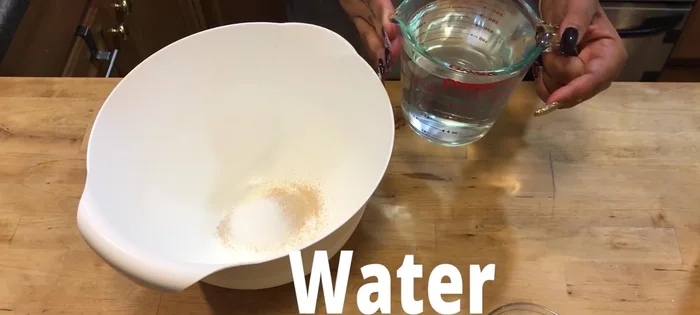 Gradually add water and mix until a batter forms. The batter should be very liquid, like pancake batter.