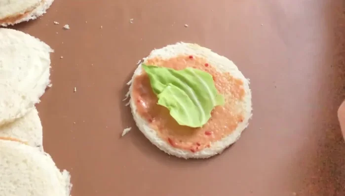 Top with another bread slice. (158.16)