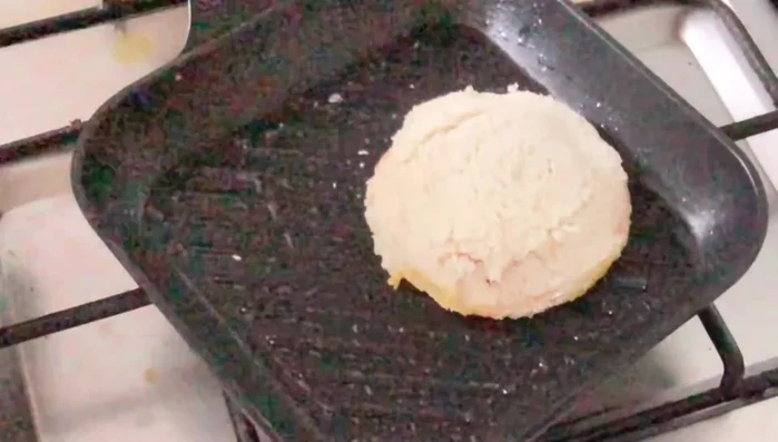 Cook the sandwich in a pan until golden brown on both sides. (222.09)