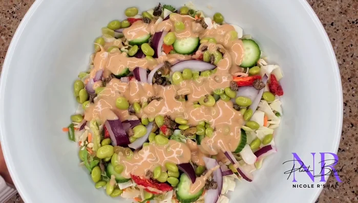Toss your prepared salad with your chosen dressing.