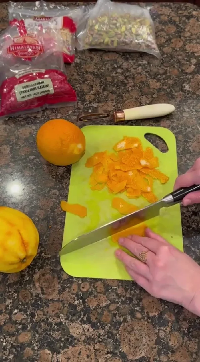 Zest two oranges, avoiding the white pith. Cut the zest into matchstick pieces.