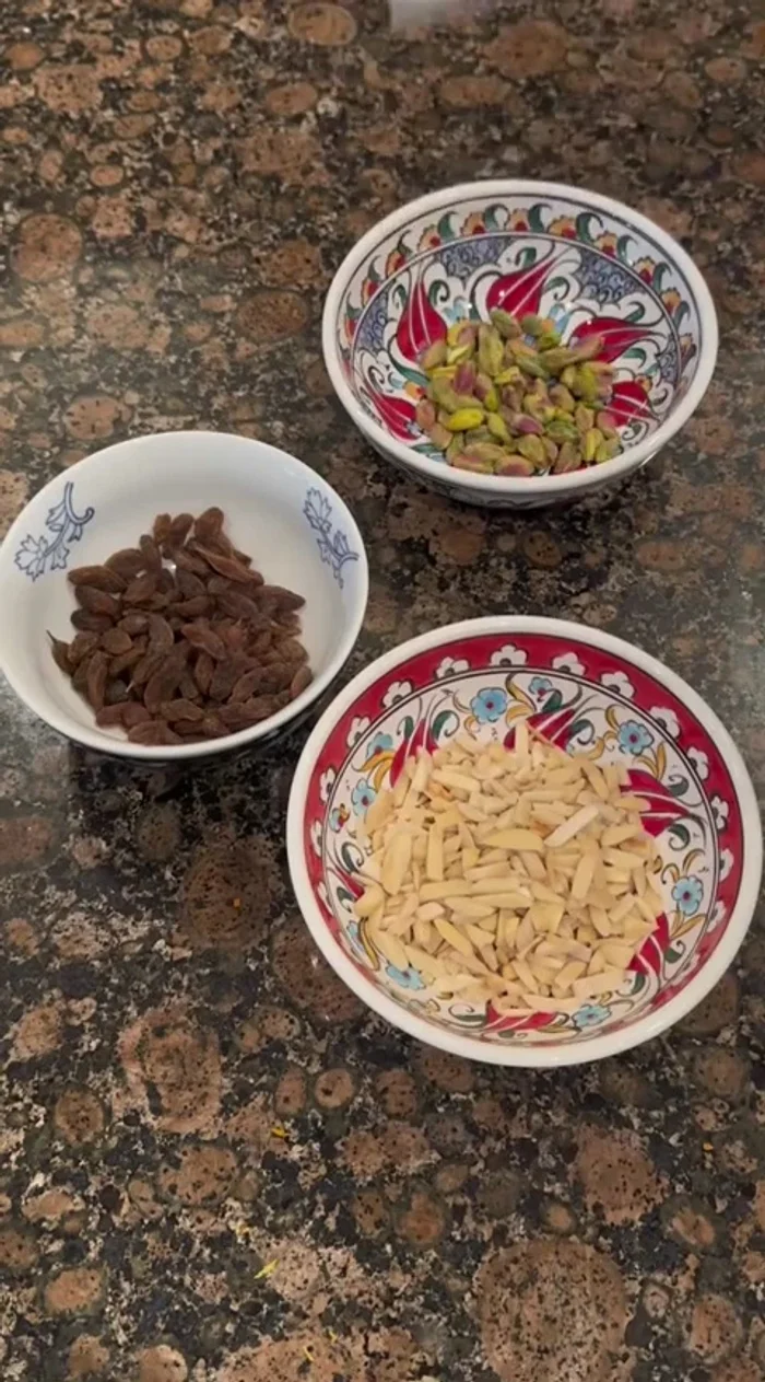 Soak raisins, pistachios, and almonds in hot water for about 30 minutes (almonds can soak longer).