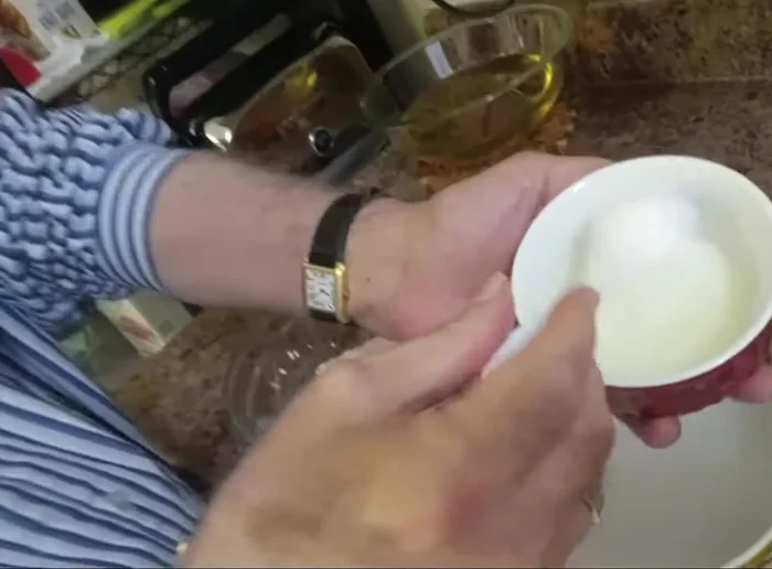 Combine wet ingredients: Add lukewarm water, milk, and oil to the dry ingredients. Mix well with your hands until a dough forms. Add more water gradually if needed.
