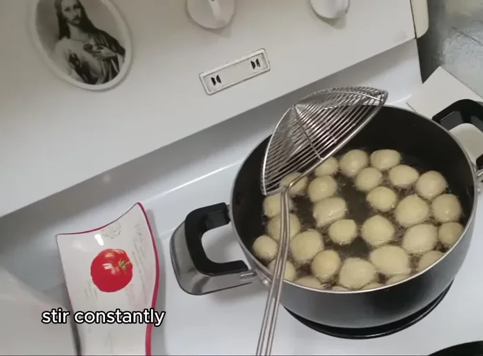 Second Fry: Reheat the oil and fry the Luqaimat again on low heat until golden brown and crispy. Remove and drain on a wire rack or strainer.