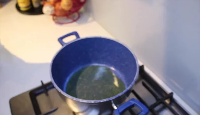 Heat olive oil and butter in a pot. Add minced onion and cook until translucent.