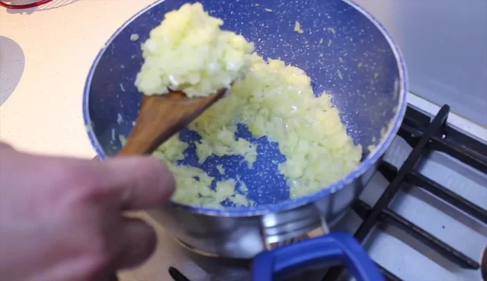 Set aside three-quarters of the cooked onion.