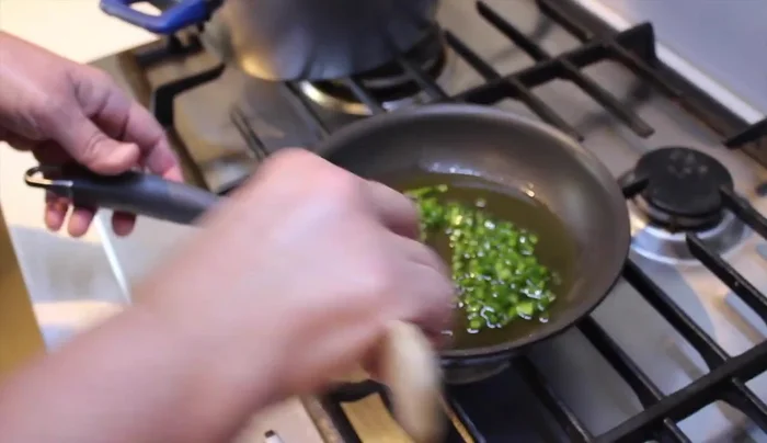 In a separate pan, shallow fry capsicum until soft. Add to the chicken mixture.