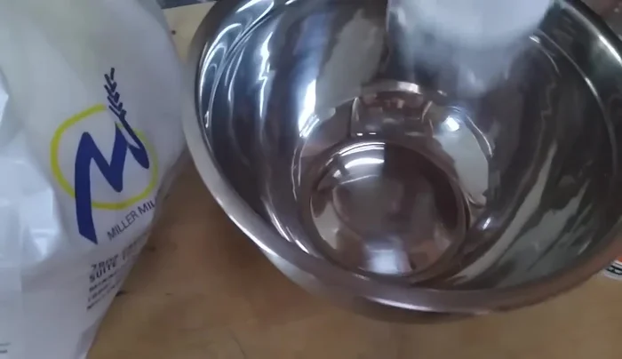 Combine flour, yeast, salt, and sugar in a mixing bowl.