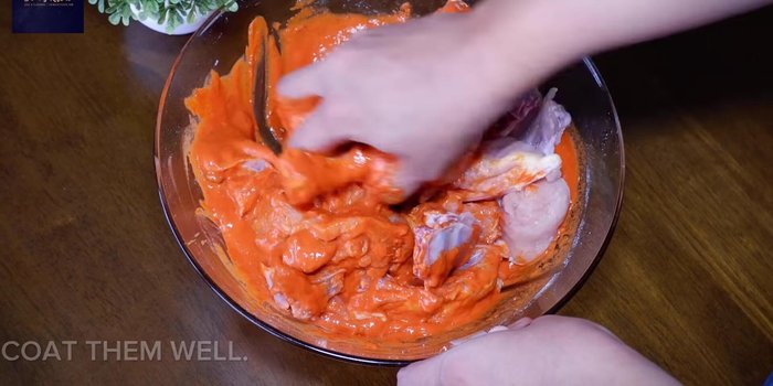 Just before frying, add 1 tsp of rice flour to the marinated chicken and mix well.