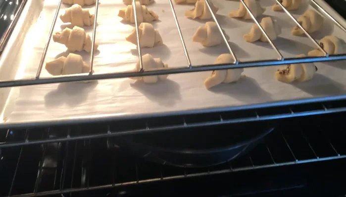 The next day, fill a pan with hot water and place the croissants in the oven for 1 1/2 to 2 hours.