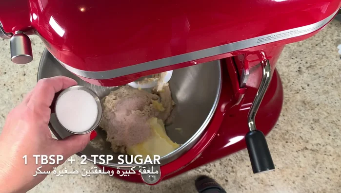 Add room temperature milk and bread flour. Cover the dough and let it rest for 1 1/2 hours, or until doubled in size.