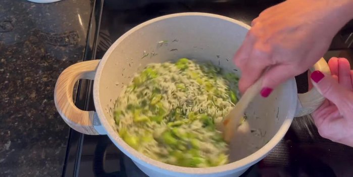 Add salt and 2 3/4 cups of boiled water.