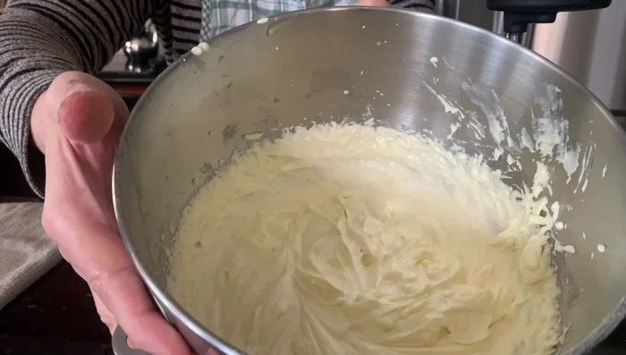 Divide the dough and roll into small balls. Place them into baking cups.