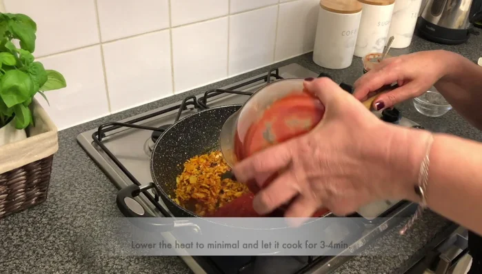 Add the sauce, reduce heat to low, and simmer for 3-4 minutes. (141.68)
