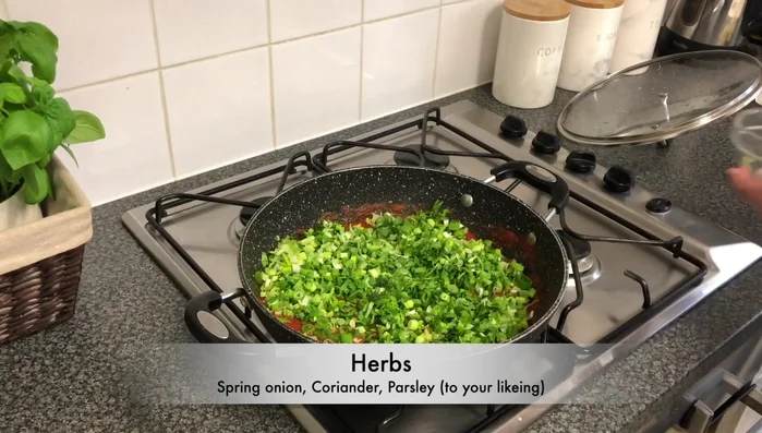 Stir in fresh chopped spring onion, coriander, and parsley. (158.8)