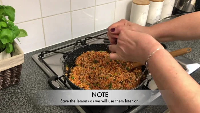 Add fresh lemon juice to the filling. Set aside some lemon halves. (213.84)