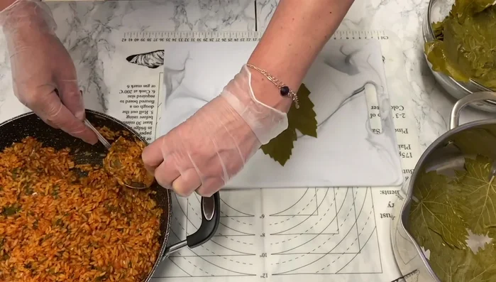 Fill each vine leaf with about one tablespoon of the rice mixture. Wrap carefully. (262.8)