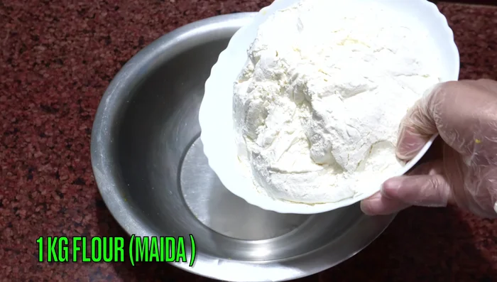 Add flour gradually and mix until a soft dough forms (103-135.2). Add water as needed. (133.08-135.2)