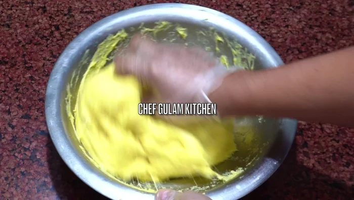 Once risen, punch down the dough and divide it into equal-sized pieces. (190.72-215.239)